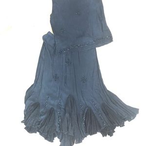 Worn once! O.P.C. Size M, separate tank and skirt.